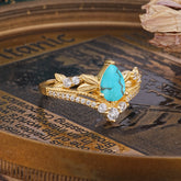 Nature-Inspired Pear-Cut Turquoise Couple's Engagement Ring Set